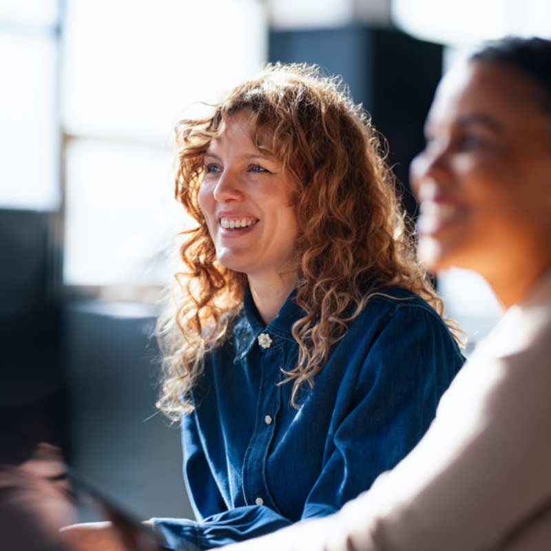 A smiling female office worker